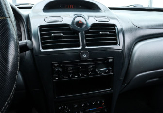 Подержанный автомобиль Nissan Almera Classic 2006 года (12 фото)