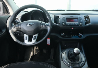 Подержанный автомобиль Kia Sportage 2013 года (10 фото)