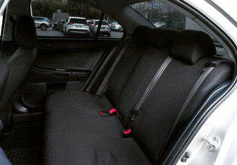 Подержанный автомобиль Mitsubishi Lancer Sedan 2013 года (18 фото)
