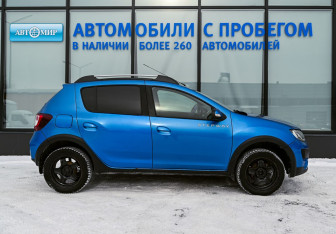 Подержанный автомобиль Renault Sandero 2015 года (6 фото)