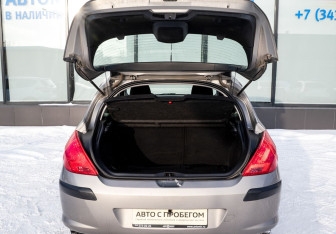 Подержанный автомобиль Peugeot 308 Hatchback 2010 года (18 фото)