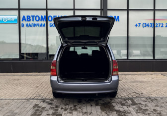 Подержанный автомобиль Toyota Corolla Wagon 2003 года (18 фото)