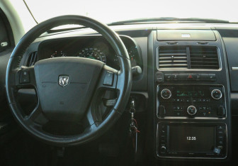 Подержанный автомобиль Dodge Journey 2010 года (10 фото)