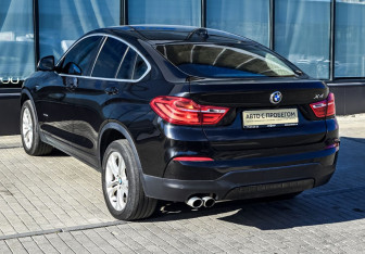 Подержанный автомобиль BMW X4 2015 года (3 фото)