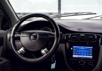 Подержанный автомобиль Chevrolet Lacetti Sedan 2005 года (16 фото)