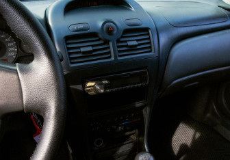 Подержанный автомобиль Nissan Almera Classic 2007 года (11 фото)