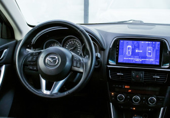 Подержанный автомобиль Mazda CX-5 2014 года (19 фото)