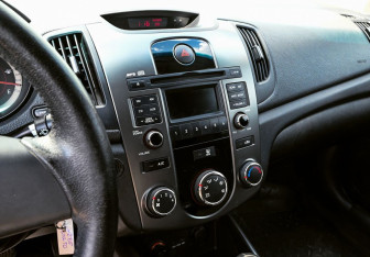 Подержанный автомобиль Kia Cerato Sedan 2010 года (11 фото)