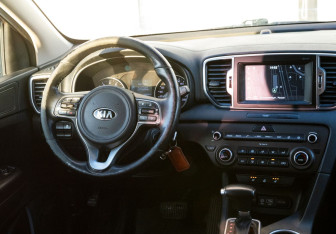 Подержанный автомобиль Kia Sportage 2017 года (10 фото)
