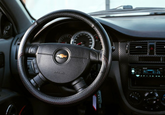 Подержанный автомобиль Chevrolet Lacetti Sedan 2010 года (11 фото)