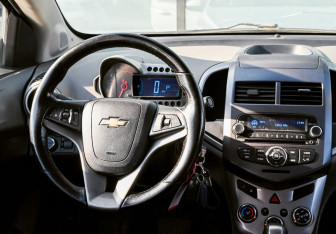 Подержанный автомобиль Chevrolet Aveo Sedan 2012 года (19 фото)