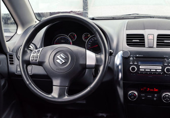 Подержанный автомобиль Suzuki SX4 Hatchback 2010 года (12 фото)