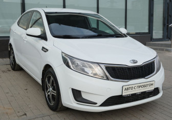 Подержанный автомобиль Kia Rio Sedan 2014 года (7 фото)