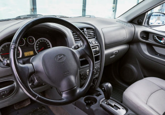 Подержанный автомобиль Hyundai Santa Fe 2012 года (10 фото)