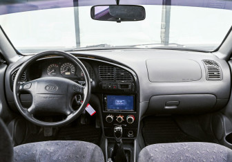 Подержанный автомобиль Kia Spectra Sedan 2006 года (12 фото)