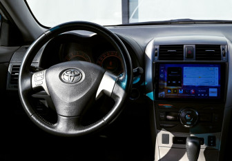 Подержанный автомобиль Toyota Corolla Sedan 2007 года (18 фото)