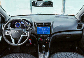 Подержанный автомобиль Hyundai Solaris Sedan 2013 года (12 фото)