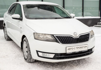 Подержанный автомобиль Skoda Rapid Liftback 2015 года (7 фото)