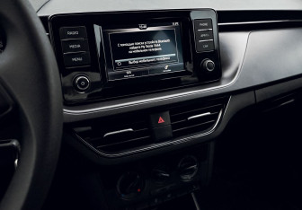 Подержанный автомобиль Skoda Rapid Liftback 2021 года (11 фото)