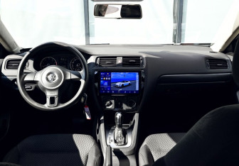Подержанный автомобиль Volkswagen Jetta Sedan 2014 года (16 фото)