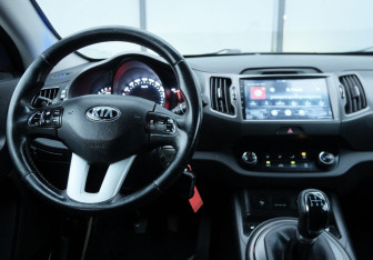 Подержанный автомобиль Kia Sportage 2013 года (10 фото)