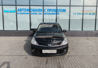 Подержанный автомобиль Nissan Tiida Hatchback 2012 года (8 фото)