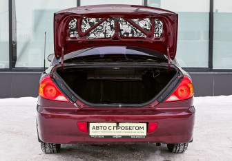 Подержанный автомобиль Kia Spectra Sedan 2006 года (19 фото)