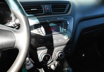 Подержанный автомобиль Kia Rio Sedan 2012 года (11 фото)