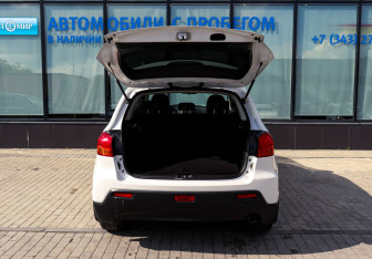Подержанный автомобиль Mitsubishi ASX 2013 года (18 фото)