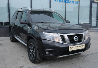Подержанный автомобиль Nissan Terrano 2014 года (7 фото)