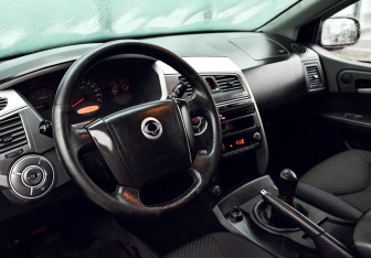 Подержанный автомобиль SsangYong Kyron 2011 года (13 фото)
