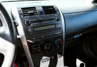 Подержанный автомобиль Toyota Corolla Sedan 2007 года (10 фото)