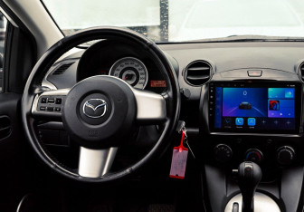 Подержанный автомобиль Mazda 2 Hatchback 2008 года (17 фото)