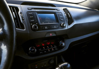 Подержанный автомобиль Kia Sportage 2014 года (11 фото)