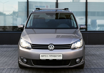 Подержанный автомобиль Volkswagen Touran 2012 года (8 фото)