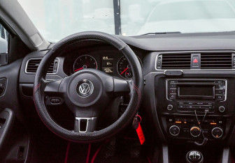 Подержанный автомобиль Volkswagen Jetta Sedan 2013 года (11 фото)