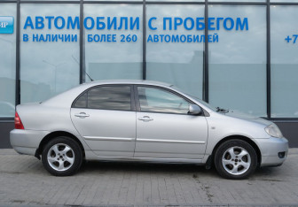 Подержанный автомобиль Toyota Corolla Sedan 2005 года (6 фото)
