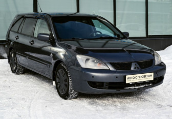 Подержанный автомобиль Mitsubishi Lancer Wagon 2006 года (7 фото)