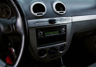 Подержанный автомобиль Chevrolet Lacetti Hatchback 2010 года (11 фото)