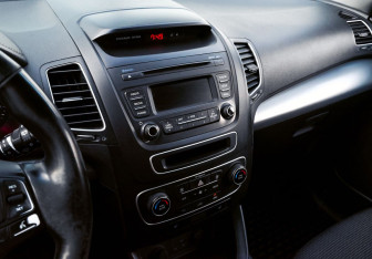 Подержанный автомобиль Kia Sorento 2015 года (15 фото)