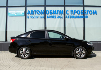 Подержанный автомобиль Kia Cerato Sedan 2012 года (6 фото)
