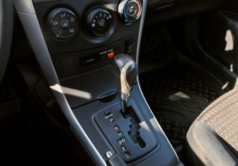 Подержанный автомобиль Toyota Corolla Sedan 2012 года (9 фото)