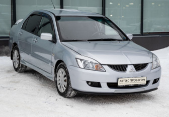 Подержанный автомобиль Mitsubishi Lancer Sedan 2004 года (7 фото)