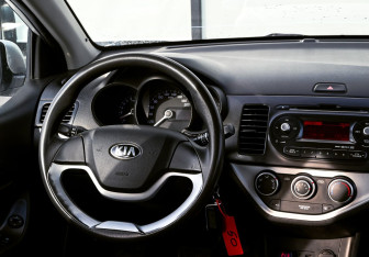 Подержанный автомобиль Kia Picanto 2013 года (11 фото)