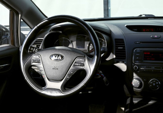 Подержанный автомобиль Kia Cerato Sedan 2015 года (19 фото)