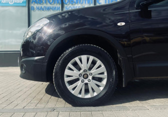 Подержанный автомобиль Nissan Qashqai 2013 года (18 фото)
