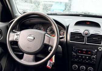 Подержанный автомобиль Nissan Almera Classic 2010 года (16 фото)
