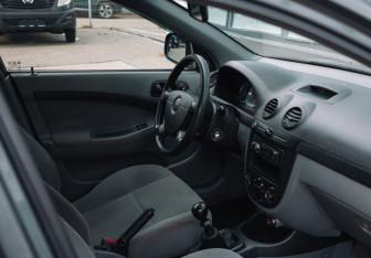 Подержанный автомобиль Chevrolet Lacetti Hatchback 2012 года (11 фото)