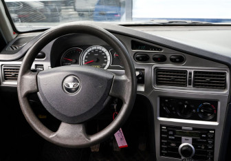 Подержанный автомобиль Daewoo Nexia Sedan 2013 года (17 фото)