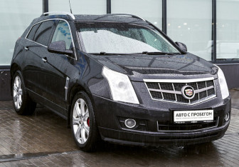 Подержанный автомобиль Cadillac SRX 2011 года (7 фото)